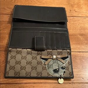Gucci Tan and Brown woman’s Wallet with Chihuahua.